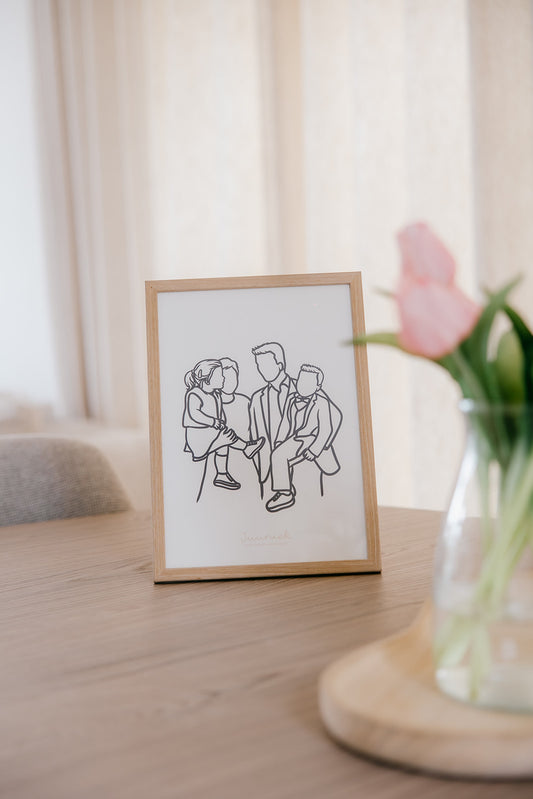 Gratis lijntekening-print in houten kader op tafel